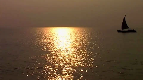 Running boat through sunset. Stock-Footage 25455799