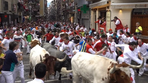The Running of the Bulls in Spain Stock Footage 117176424