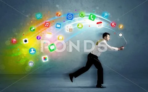 Running businessman with application icons from device Stock Photos