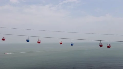 Running cable car over the sea Stock Footage 133976287