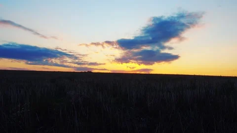 Running clouds and sky at sunset. Video stock 160420280