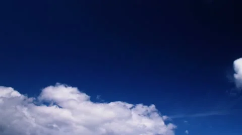 Running clouds on dark blue sky time lapse t3373 Video stock 11526216