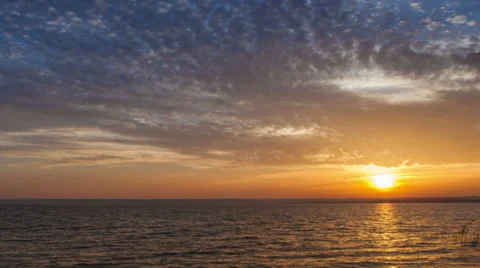 Running clouds on the Great sky over lake time lapse footage Stock Footage 34557054