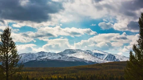 Running Clouds With Mountain and Trees Stock Footage 49410241