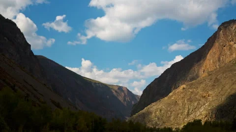 Running Clouds With Mountain and Trees Stock Footage 49410263