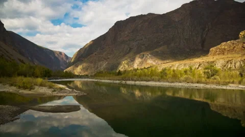 Running Clouds With Mountain and Trees Stock Footage 49410509