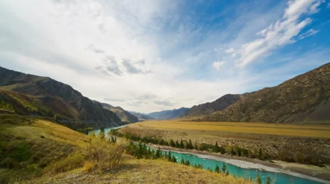 Running Clouds With Mountain and Trees Stock Footage 49410614