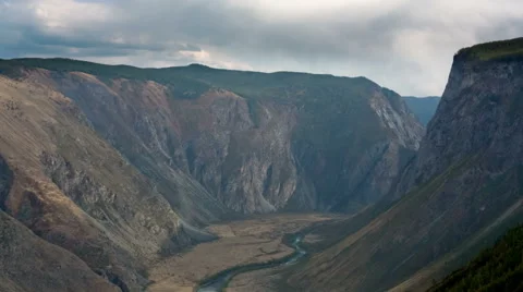 Running Clouds With Mountain and Trees Stock Footage 49410663