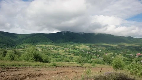Running Clouds With Mountain Range and Trees Timelapse. Carpathian Mountains Stock Footage 85285367