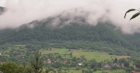Running Clouds With Mountain Range and Trees Timelapse. Carpathian Mountains Stock Footage 85361267
