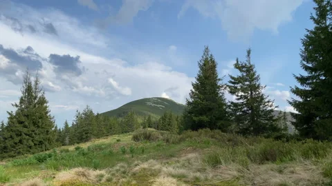 Running Clouds in Mountains, timelapse Stock Footage 146935134