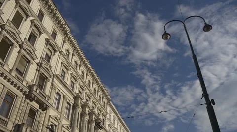 Running clouds over city architecture Stock Footage 67580302