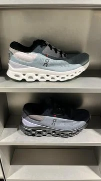 On Running Cloudsurfer shoes on display with CloudTec technology at Jinguma.. Stock Photos