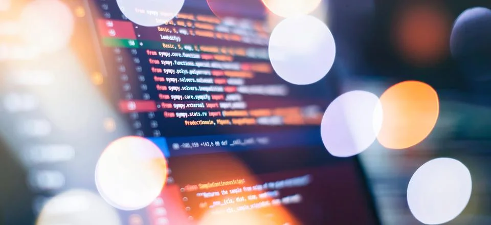 Running Computer data programming. Coding script text on screen. Stock-Fotos