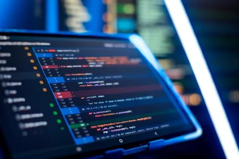 Running Computer data programming. Coding script text on screen. Notebook c.. Stock Photos