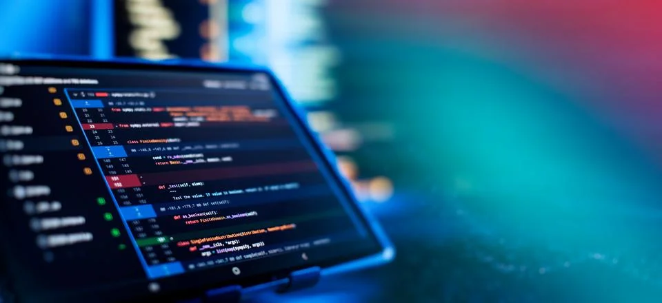 Running Computer data programming. Coding script text on screen. Notebook c.. Stock Photos