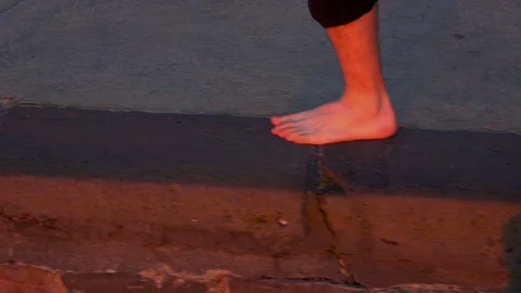 Running on Concrete in Slow Motion. St Kilda beach Sunset Stock Footage 69740230