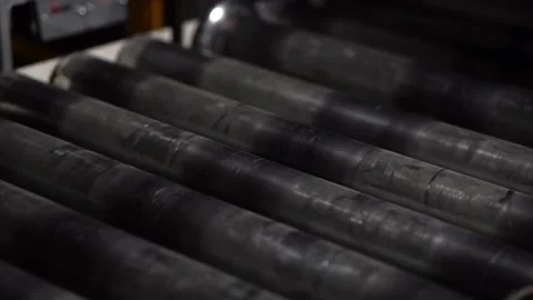Running conveyor rollers in slow motion Stock Footage 203855860
