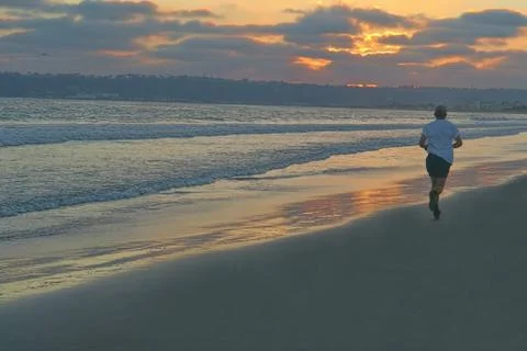 Running on Coronado beach Stock Photos