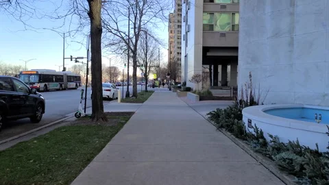 Running down a sidewalk Stock Footage 144314358