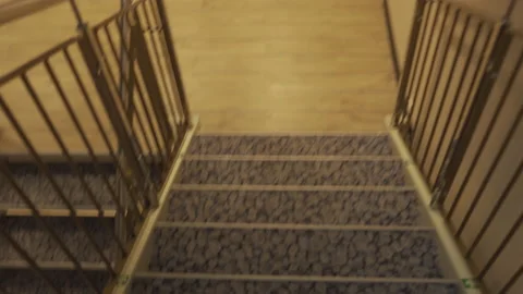 Running down stairs, first person view. FPW of escaping. Stock Footage 144117698