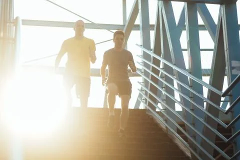 Running down the stairs Stock Photos