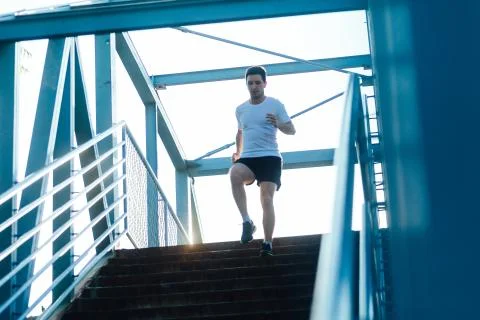 Running down the stairs Stock Photos
