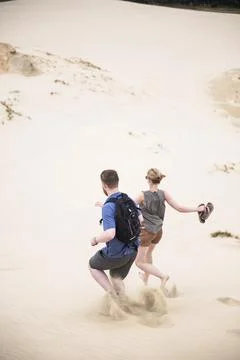 Running down Te Paki Sand Dunes, 90 Mile Beach, New Zealand Stock Photos