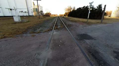 Running down the train tracks Video stock 44476436