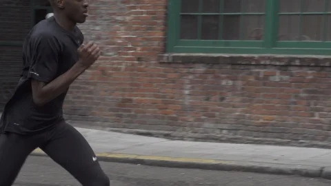 Running Downtown Stock Footage 86880667