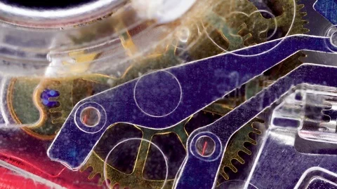 The running engine on the transparent watch in a macro shot 動画素材 102472381