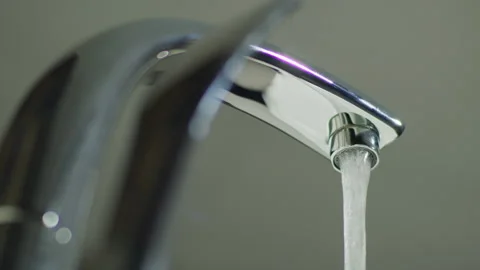 Running Faucet Tap below Stock Footage 260355088