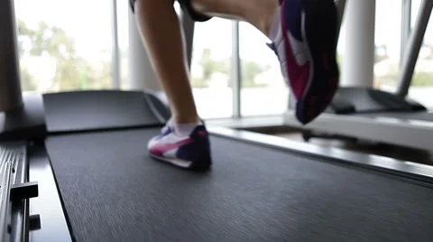 Running foot on a treadmill Video stock 40471002