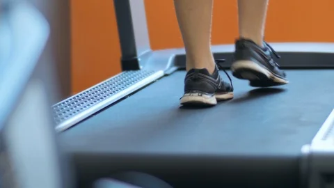 Running foot on a treadmill Video stock 108579473
