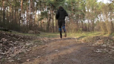 Running in the Forest Stock Footage 63981637