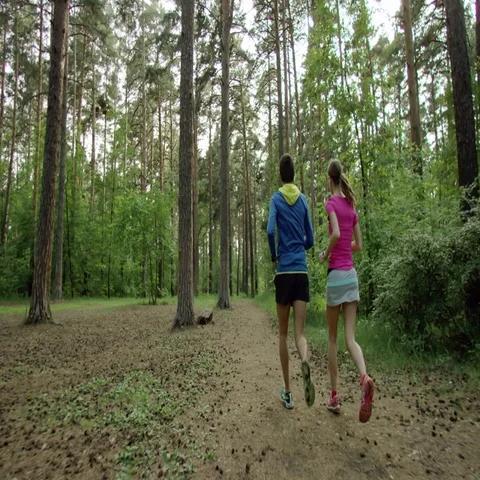 Running in a forest Stock Footage 69730017