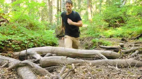 Running Up Forest Trail Stock Footage 12028187