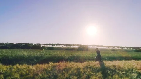 Running to the future. Young businessman with elegant suit and briefcase in the Stock Footage 84092569