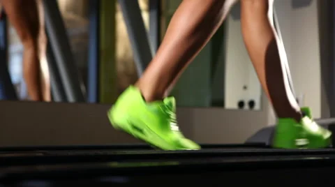 Running at the gym on the treadmill Stock Footage 49732309