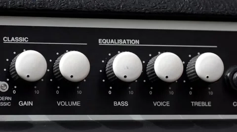 Running Hand Over EQ Knobs On a Guitar Amp Video stock 49600759