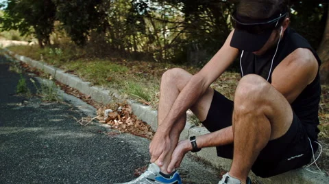 Running injury man Stock Footage 53084996