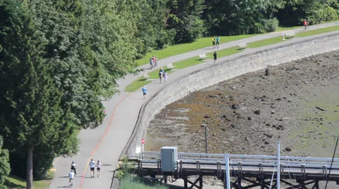 Running Jogging Walking Sea Wall Vancouver High Zoom Video stock 25570985
