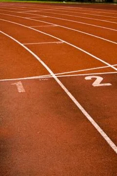 Running lanes on a track in play gorund Stock Photos