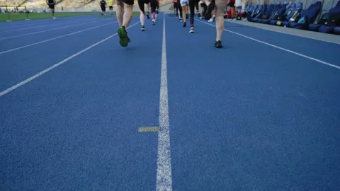 Running legs on the stadium. close-up Stock Footage 171566258