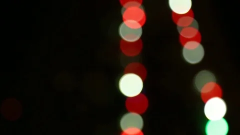 Running lights. glowing Christmas tree, defocused, colorful bokeh Video stock 79794351