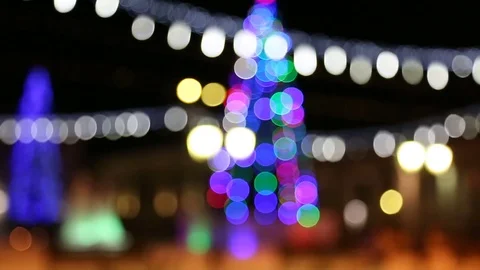 Running lights. glowing Christmas tree, defocused, colorful ambient abstract Stock Footage