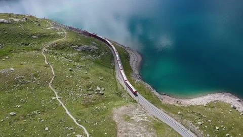 Running live mountain glacier express near by deep ditch Video stock 138258553