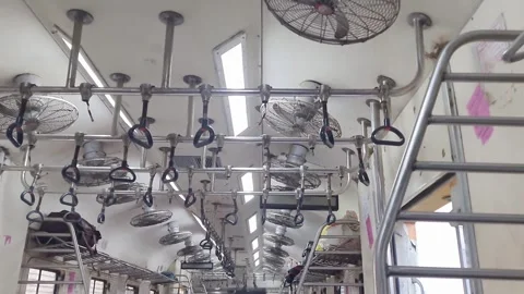Running local train handlebar for passenger inside view at day 스톡 동영상 309861690