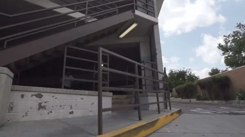 Running Man Does Parkour in Business Suit - Slow Motion. Down Town Urban Area Stock Footage 50481237