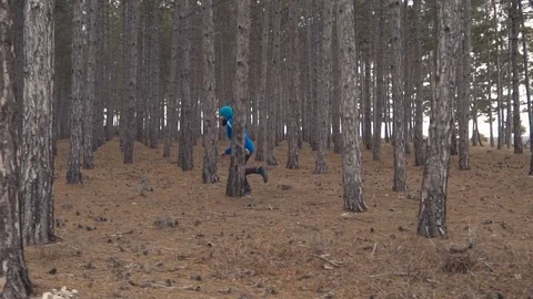 Running man in forest woods, old school hipster runner. Super slow motion Video stock 85220825